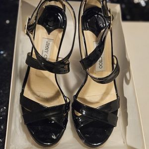 Jimmy Choo Black Patent Leather Wedge Sandals.